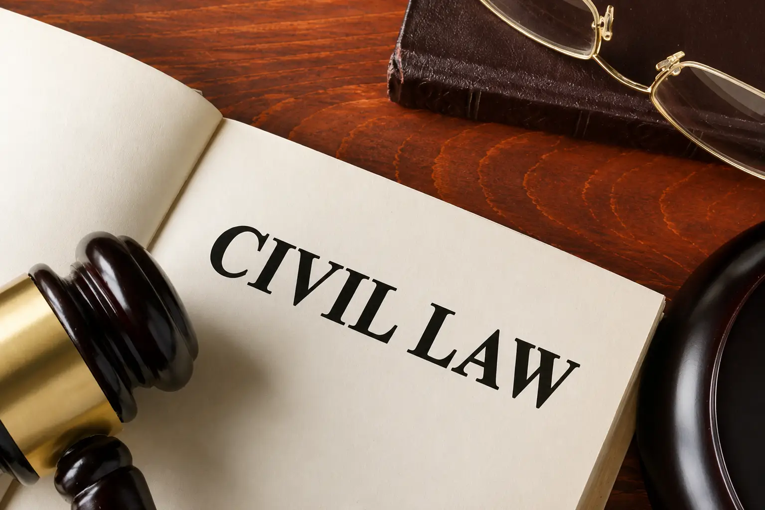 Top civil lawyer in Jalpaiguri with courtroom gavel and law book background
